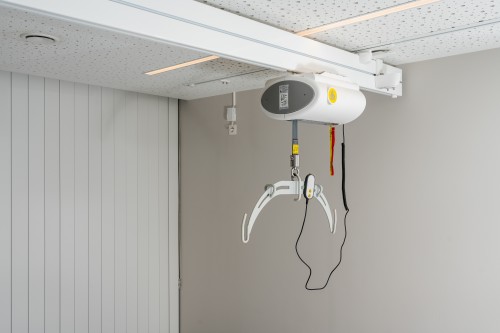 Ceiling lift - with motor fixed on the rail ; Traverse Rail - SureHands Patient lift hoist